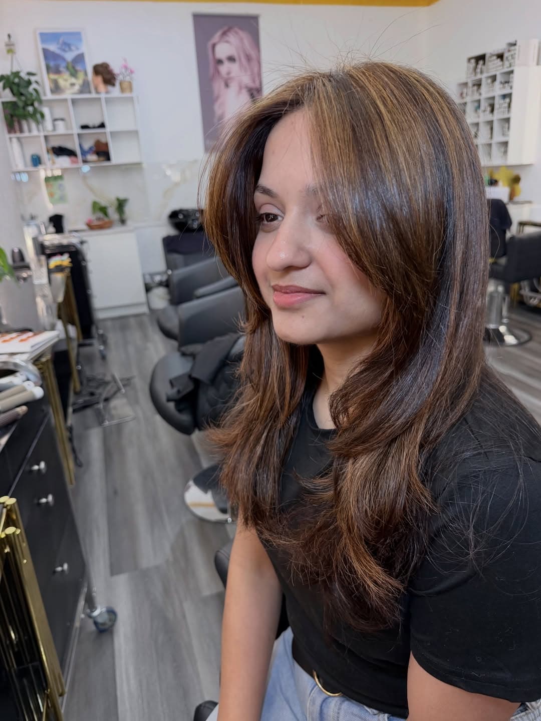 Customer's long brown layers viewed from the front